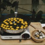 Many quail eggs on electric stove